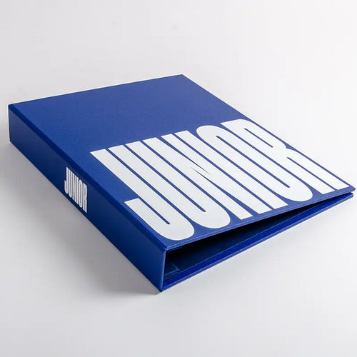 A blue 11x14 photography portfolio book personalised with white logo printed on the cover, custom made by Hartnack and Co. England