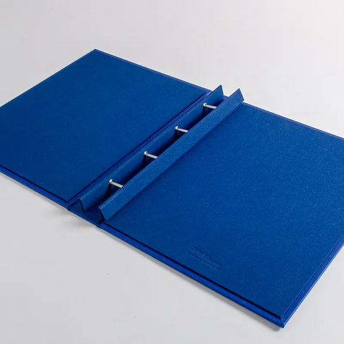 high quality screw post binder in blue cloth custom made by Hartnack and Co England