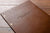 Brown leather A4 binder with gold foil embossing on the cover.