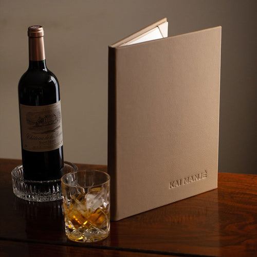 Custom and bespoke luxury leather bound menu covers with embossed personalised logo image includes wine bottle and whisky glass