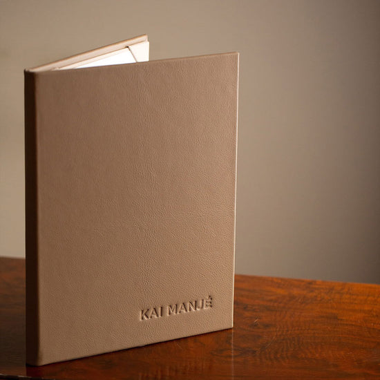 Luxury quality leather bound menu cover with embossed personalised logo