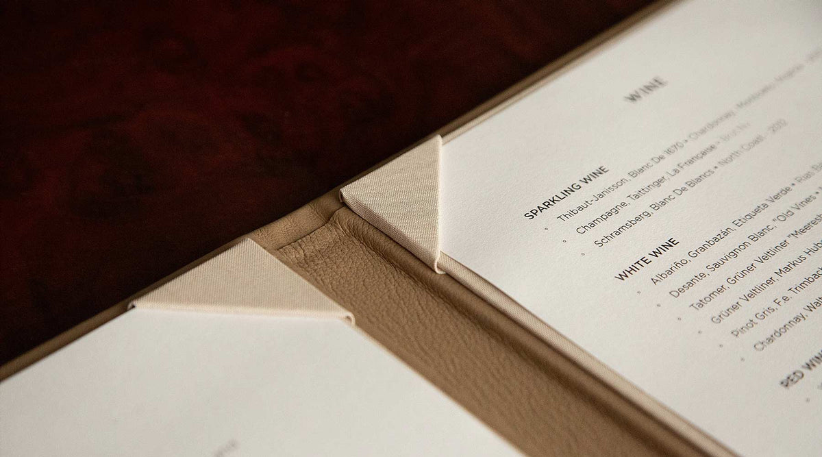 detail of quality handmade menu board in leather cover - Gallery image 8