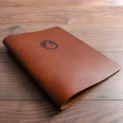 Genuine leather menu cover personalised with blind embossed logo
