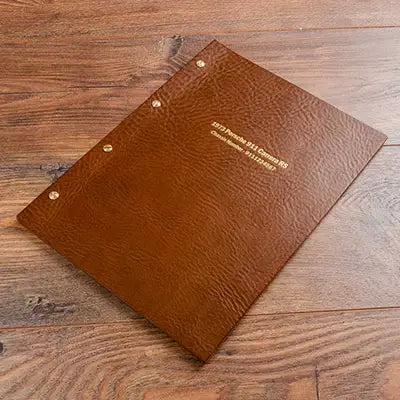 Brown leather screw post folder for a Porsche 911 with gold foil personalised cover