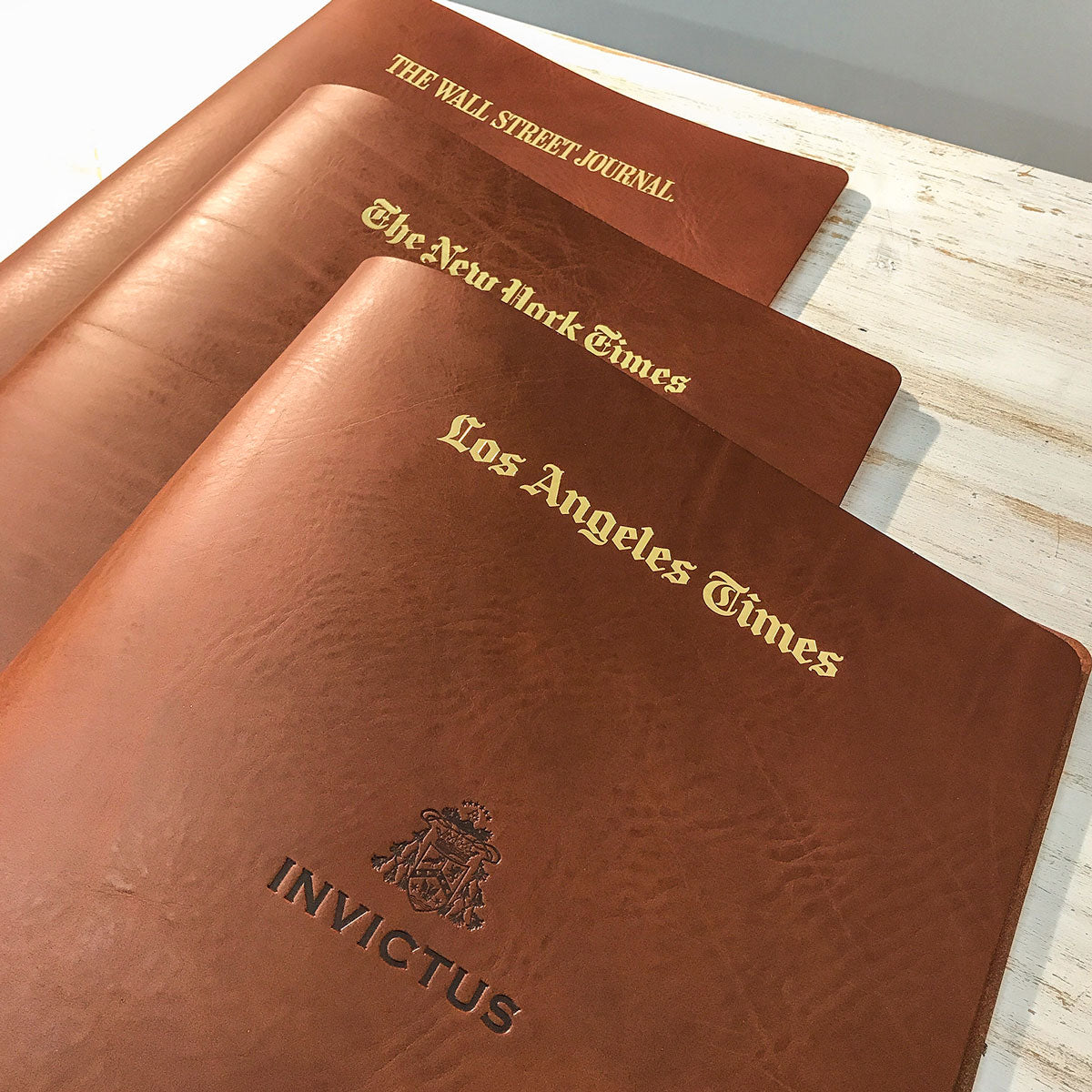 Leather binders for newspapers for use on super yacht
