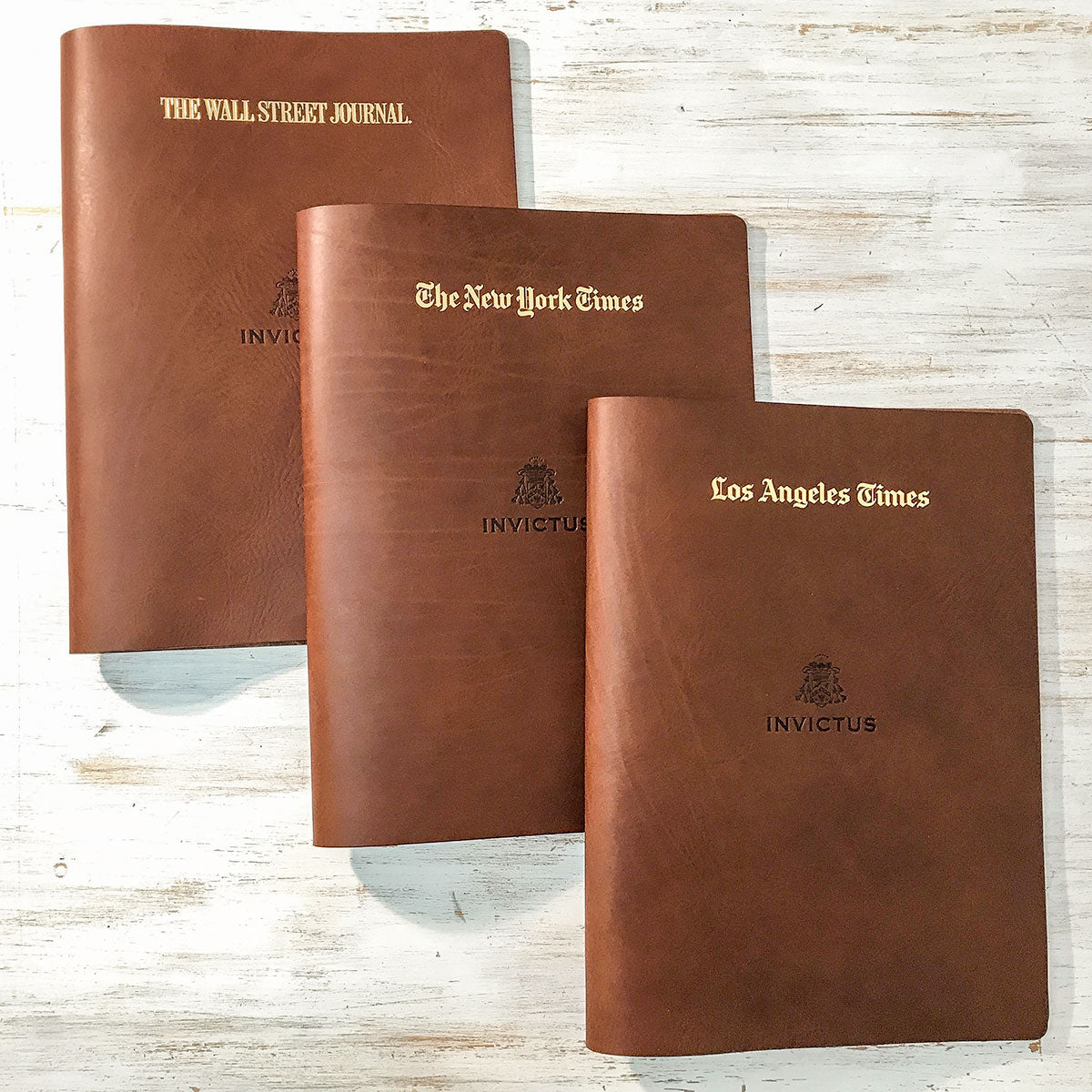 Leather binders for newspaper holders