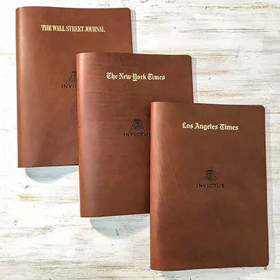 Leather screw post binders for newspaper holders personalised with gold foil embossed covers