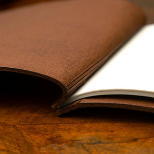 Leather Exposed Screw Post Menu binder in luxury veg tanned leather by Hartnack and Company.