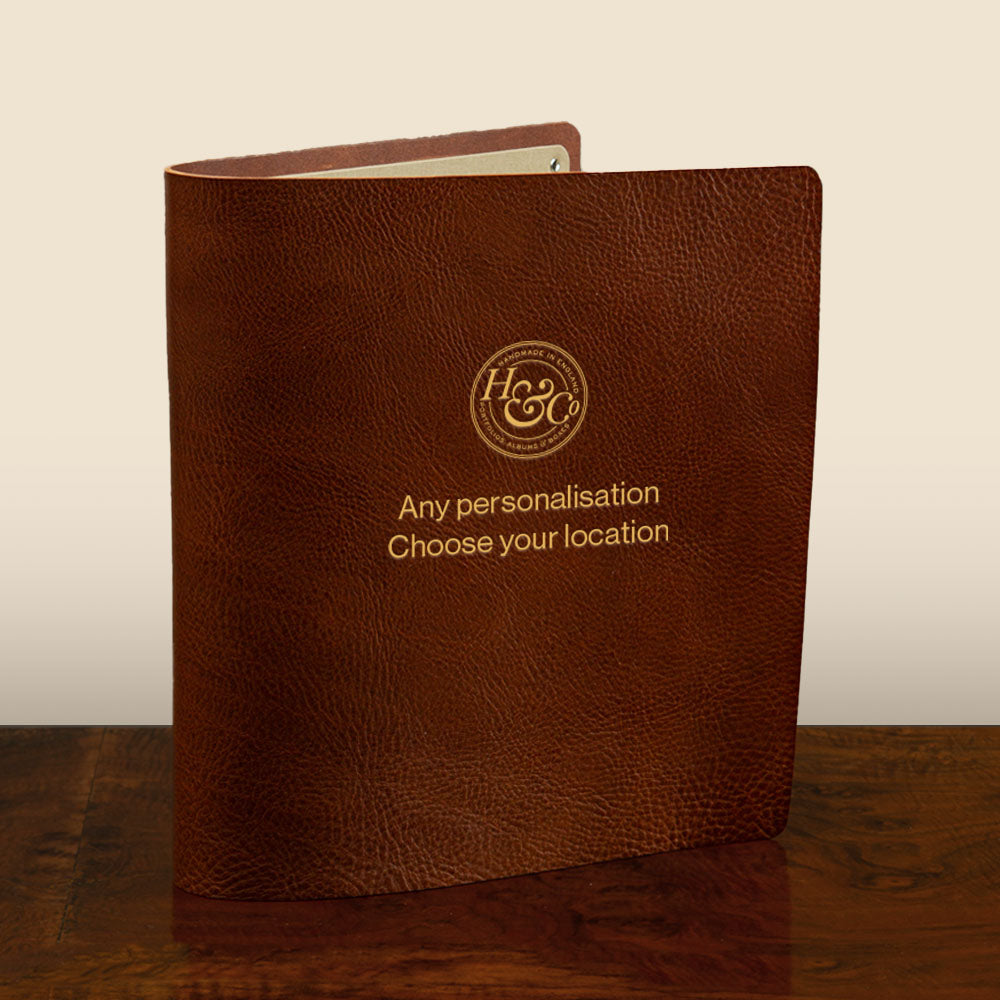 Personalised custom made brown leather ring binder with gold debossed cover hand made by Hartnack