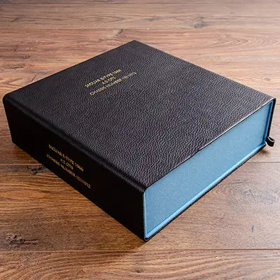 black leather box file with gold foil personalisation and blue box by hartnack and co