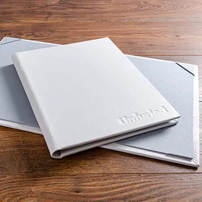 A4 2 page menu cover in white genuine leather with blind embossed personalisation