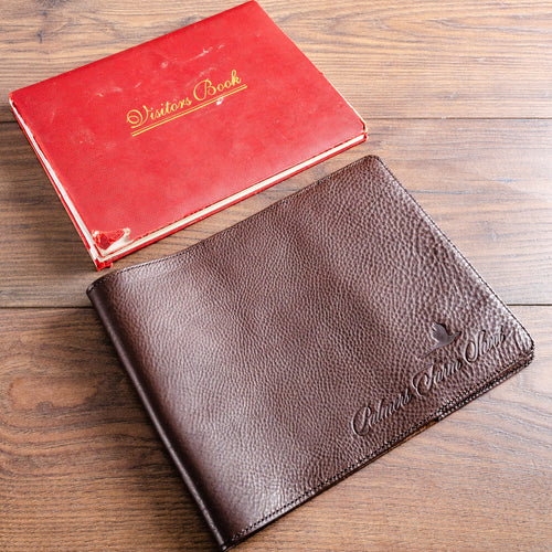 custom made bespoke and personalised leather book cover jacket for old visitors book