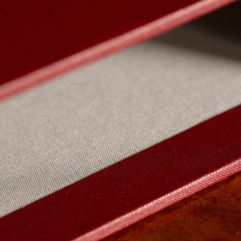 Slipcase by Hartnack and Company featuring bespoke hand-crafted fabric lining and luxury bespoke materials.