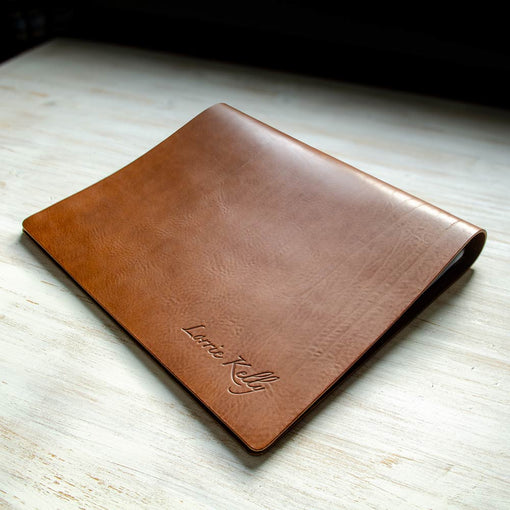 Brown leather personalised photographers portfolio book with flip over presentation format with blind embossed logo