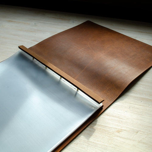 Brown leather flip-over presentation portfolio book with screw post binders