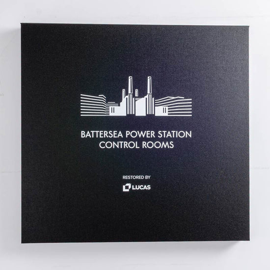 Example of white digitally printed logos and writing on a custom made clamshell presentation box by Hartnack and Co