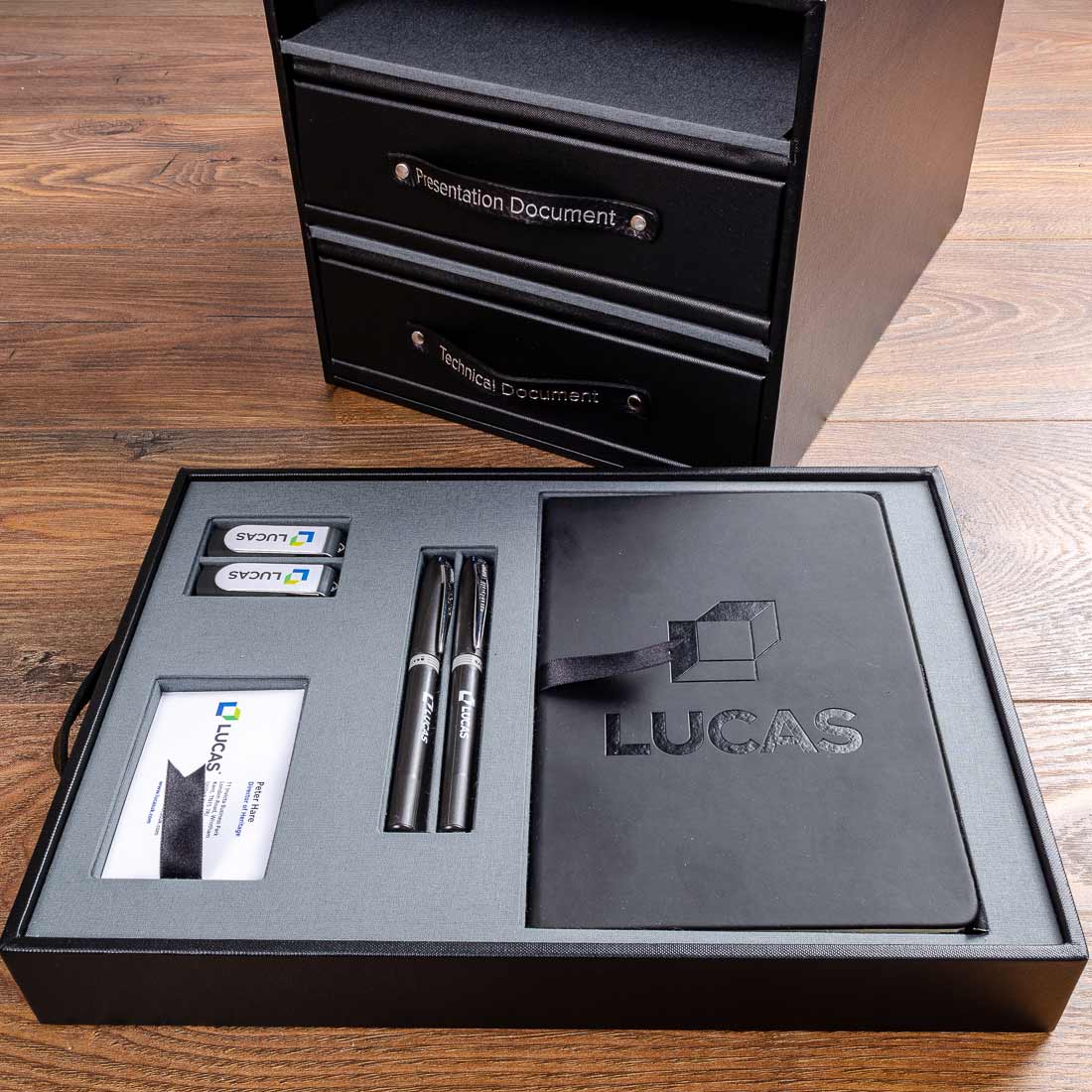 A drawer from a luxury custom made presentation box that has insets for a notepad, pens, zip drives and business cards. Handmade by Hartnack and Co - Gallery image 5