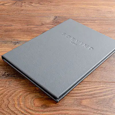 Luxury leather menu cover custom made with embossed personalised logo on cover