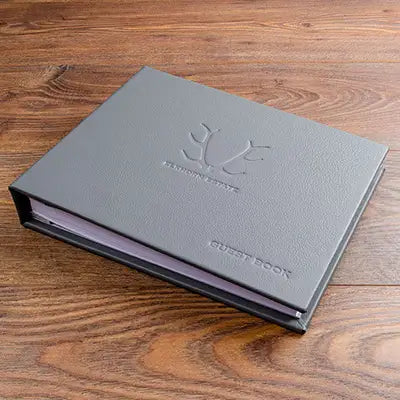 Grey genuine leather guest book with embossed cover with logo for luxury guest house