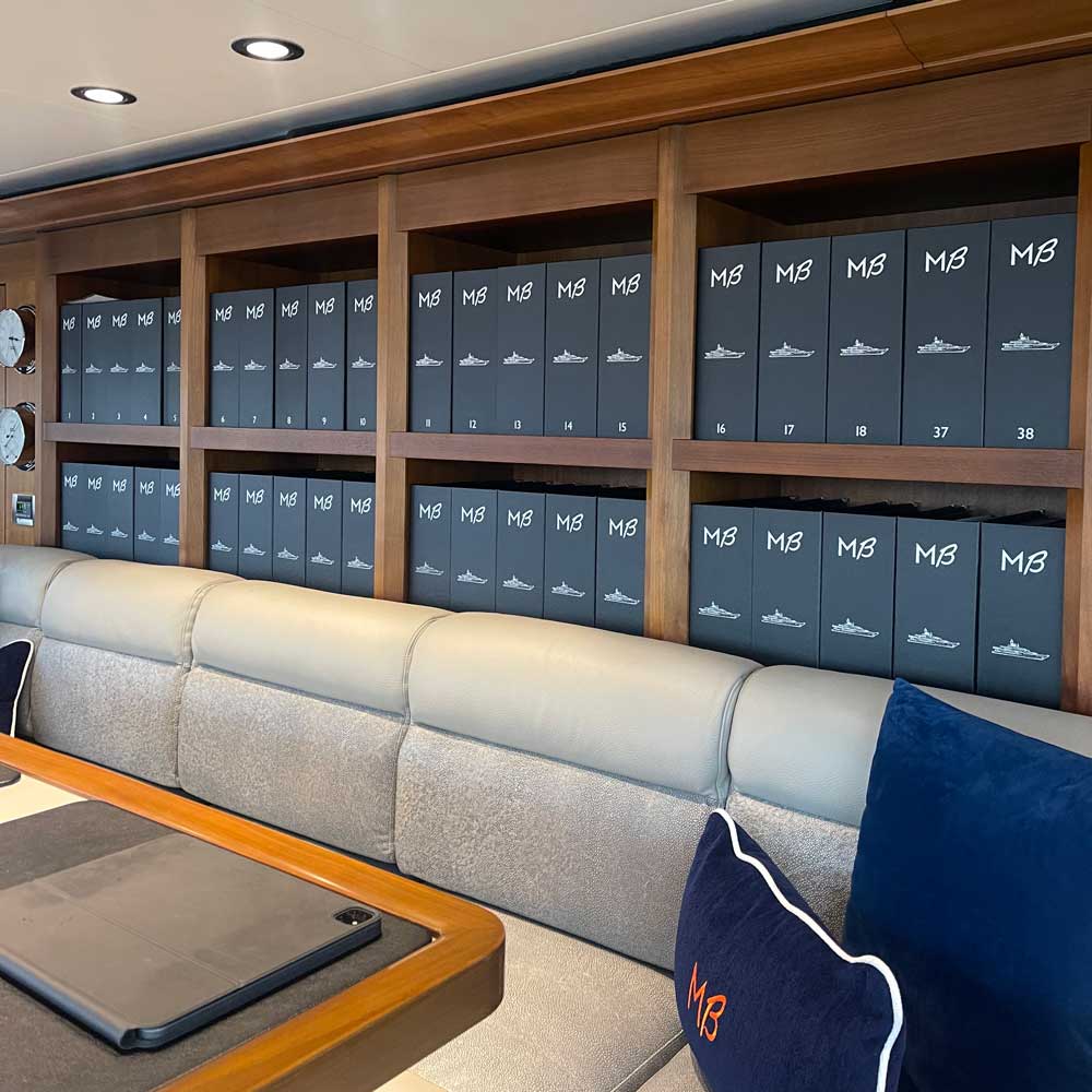 custom made personalized ring binders on the bridge of a superyacht - Gallery image 1