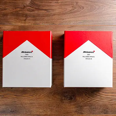 Custom made box files for a 1986 Formula 1 Marlboro McLaren race car history and documents in white and red book cloth