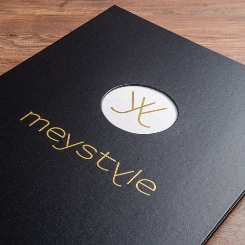 detail of gold foil personalisation on the cover of a presentation binder with a recessed window with gold foil embossed logo