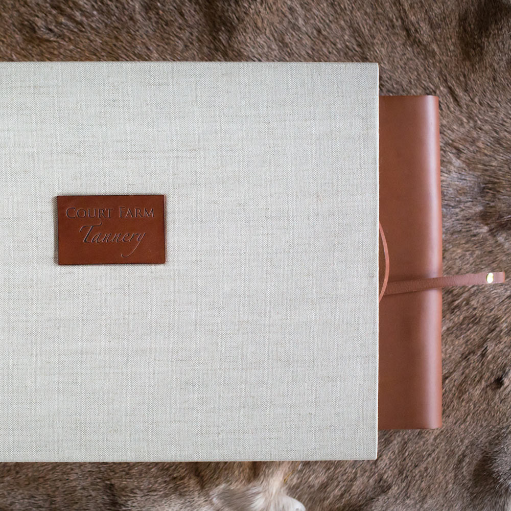 luxury fabric covered box with a personalised leather plaque and a leather album - Gallery image 1