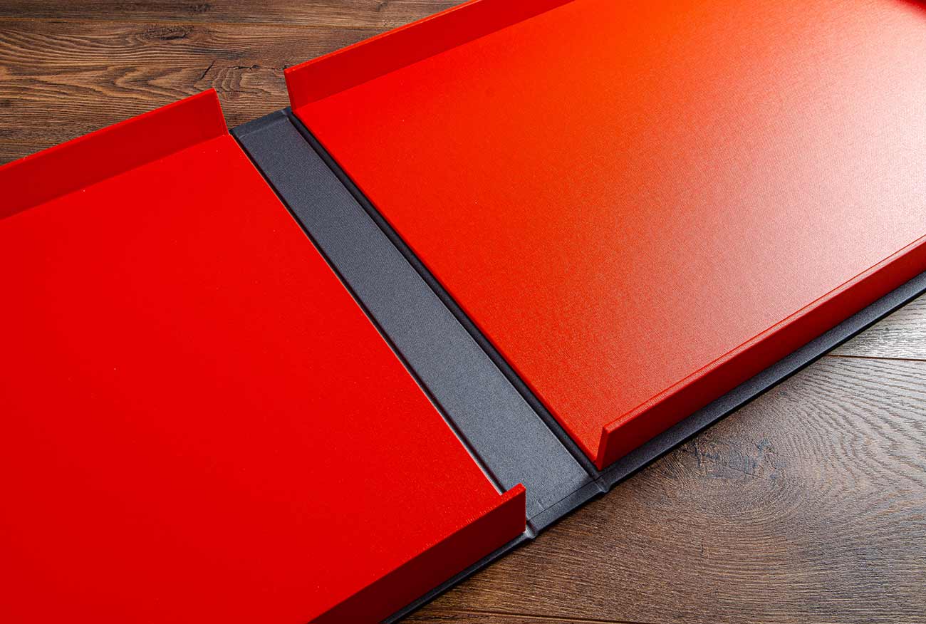 A2 clamshell photo print box in Tangerine orange buckram