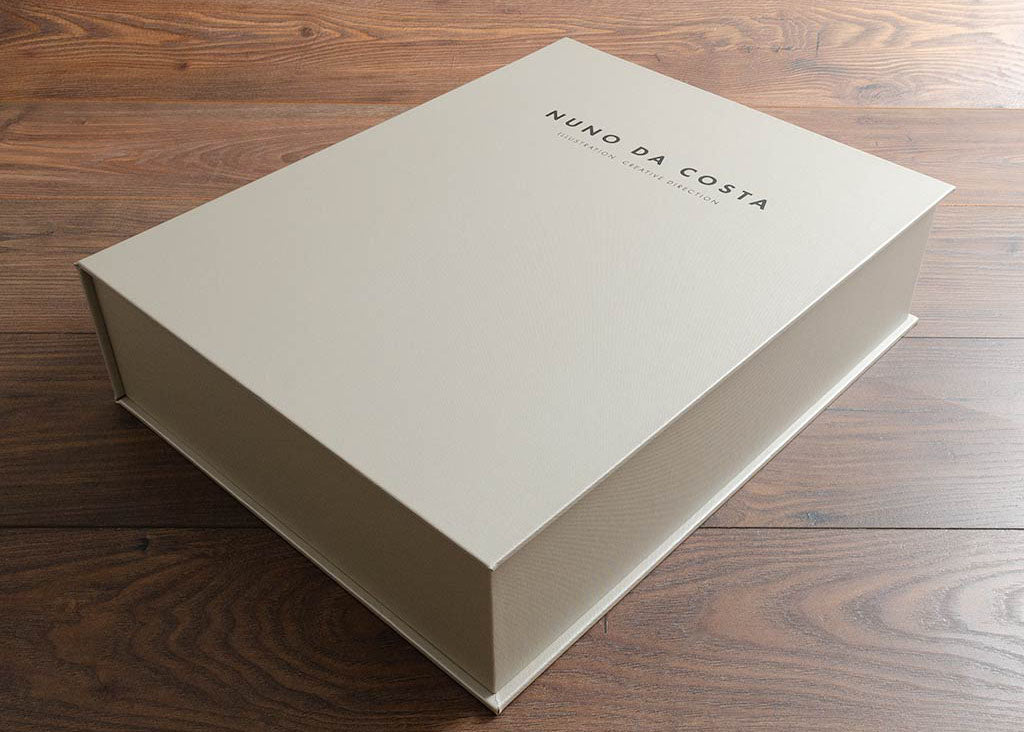 Designers presentation portfolio box. Product is a H&Co clamshell box personalised with black foil on the cover