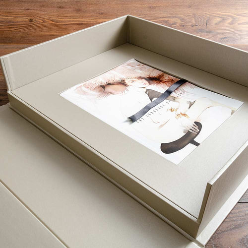 custom made cream coloured clamshell box with vogue magazine in a recess hand made by hartnack and co