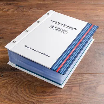 large custom car document screw post binder with a white cover, personalised cover and blue and red stripes for lancia delta integrale 