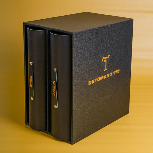 Custom made ring binder and box set with gold foil covers and leather pulls with the text 