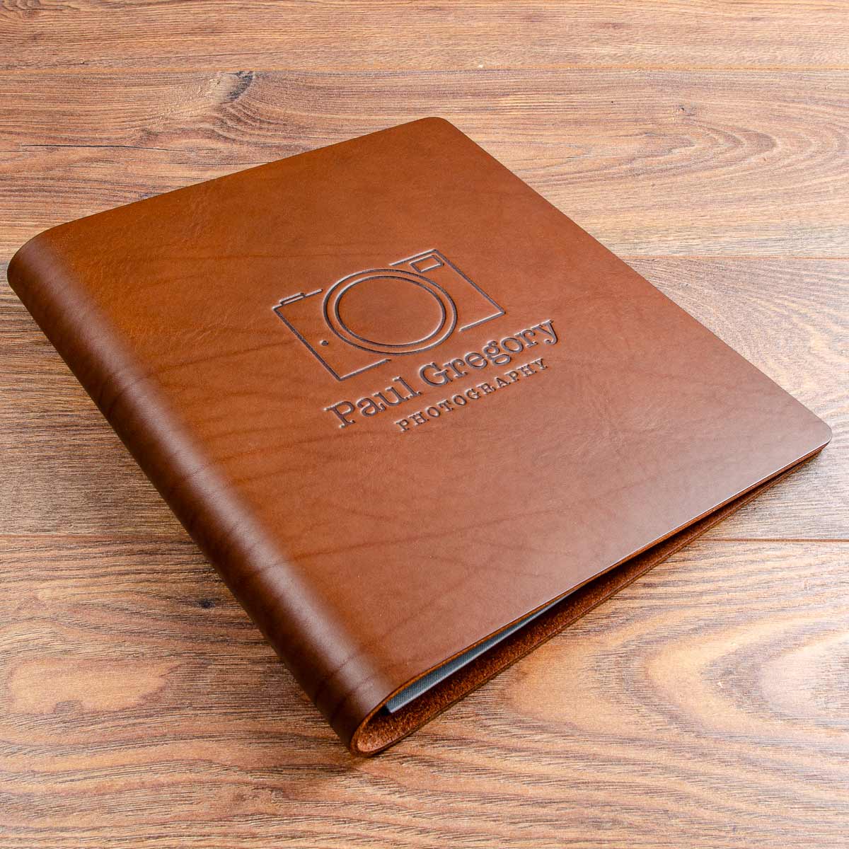 A4 leather personalised photography portfolio book with logo embossed on the cover - Gallery image 1