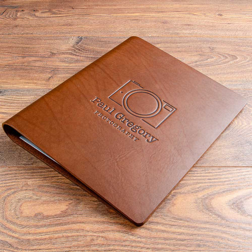 Personalised A4 leather photographers portfolio book with embossed logo on the cover. hand made by Hartnack and Co