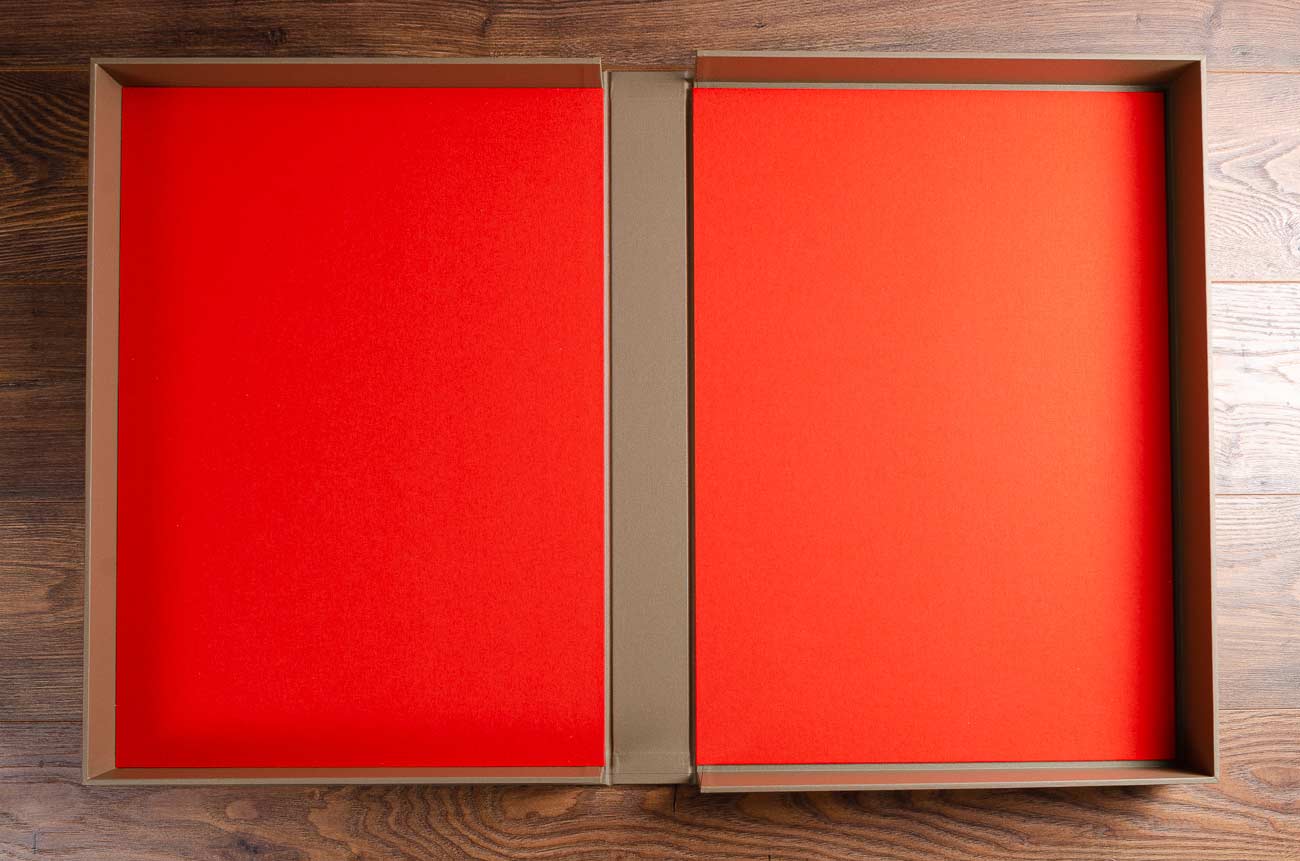 A2 clamshell box inner cover in orange buckram