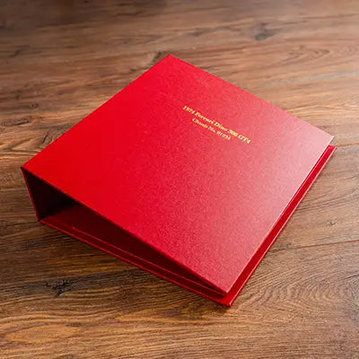 Large personalised ring binder in red with gold foil lettering embossed in the cover 