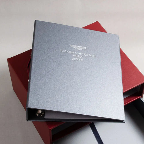 Vehicle document file silver grey ring binder with silver foil embossed cover for Aston Martin car documents