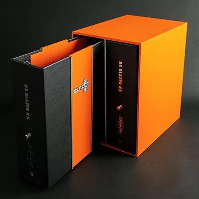 Orange box containing custom made black leather personalised ring binder files with silver foil personalisation