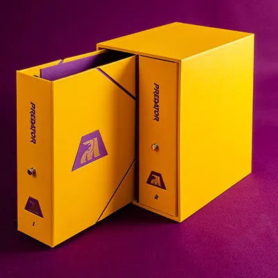 yellow slipcase box with personalised yellow binders with custom purple detail and gold foil embossing