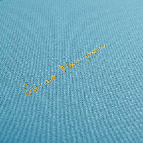 gold foil embossed personalisation on blue fabric box