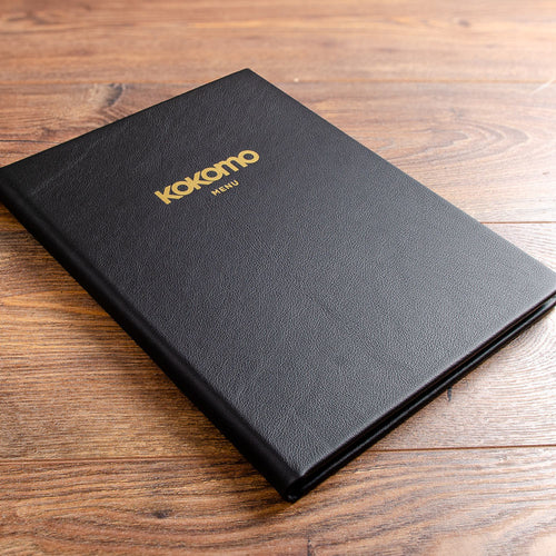 A4 menu cover in black leather with a gold foil logo on the cover and the words menu printed on the cover