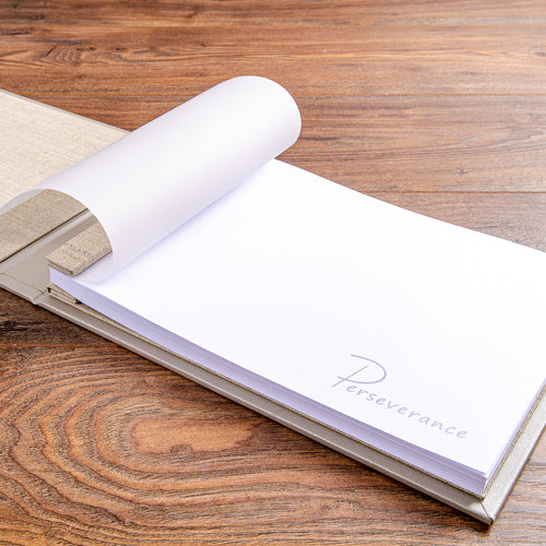 Bespoke guest book with printed logo for luxury super yacht