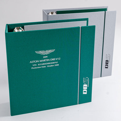 custom made vehicle document binders in green and grey for luxury aston martin car