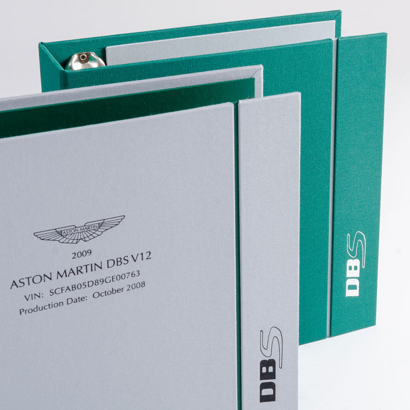 Detail of grey and green custom made car history and document files for luxury aston martin classic car   - Gallery image 3