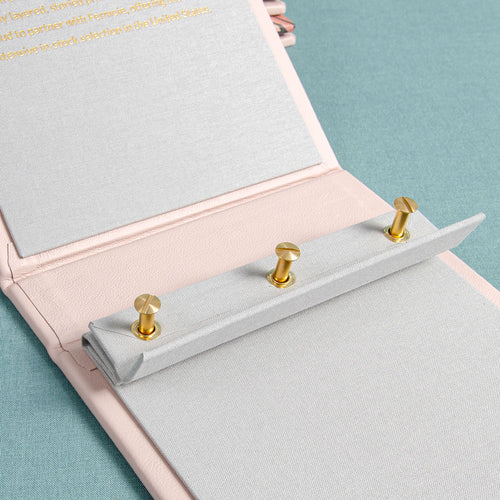 Screw post mechanism inside a custom made swatch book