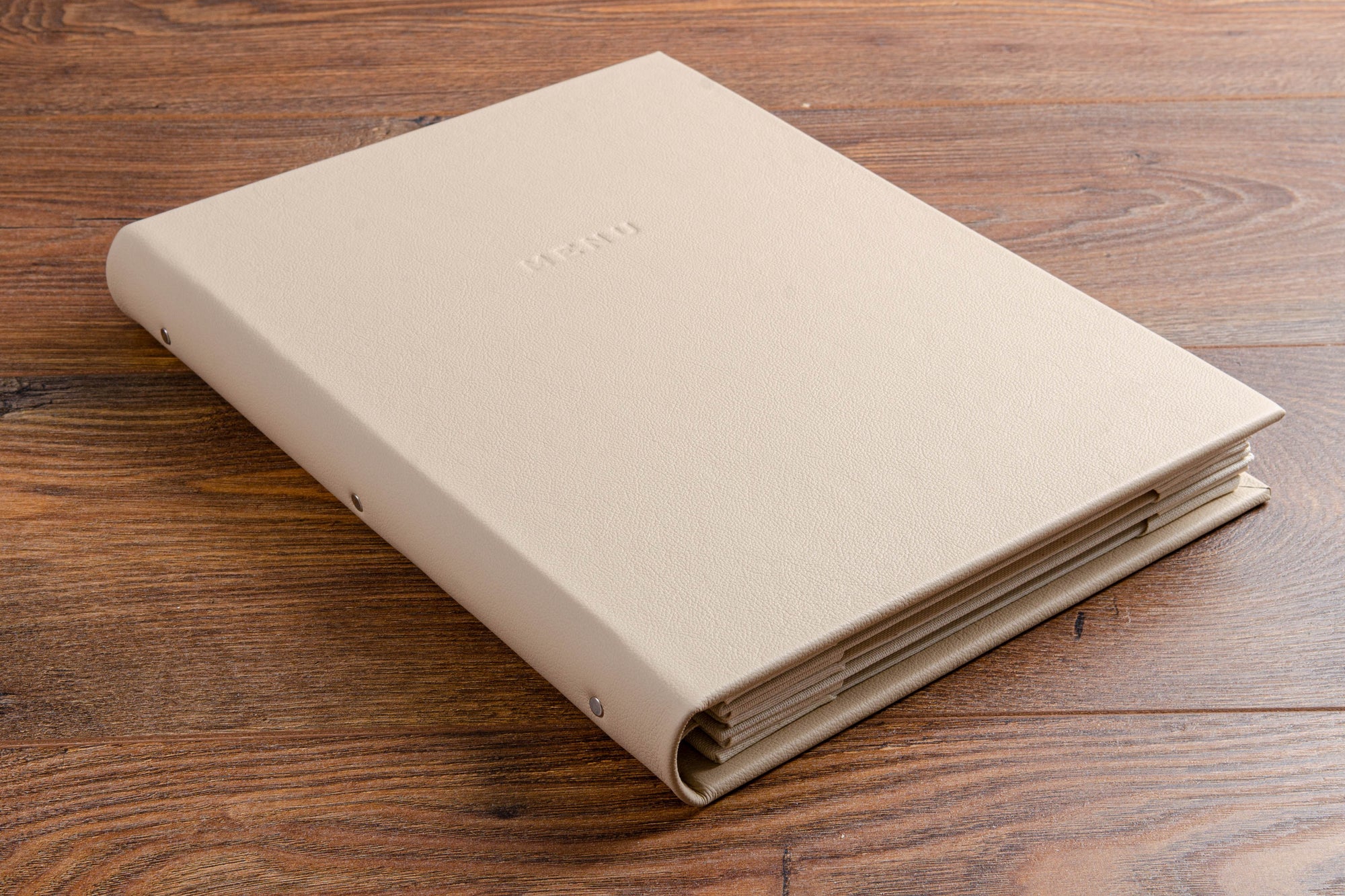 A4 Beige screw post binder. Personalised for the yachting industry.