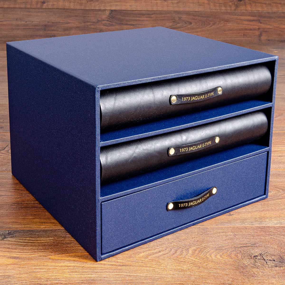 Slipcase box with black leather binders for Jaguar E type documents