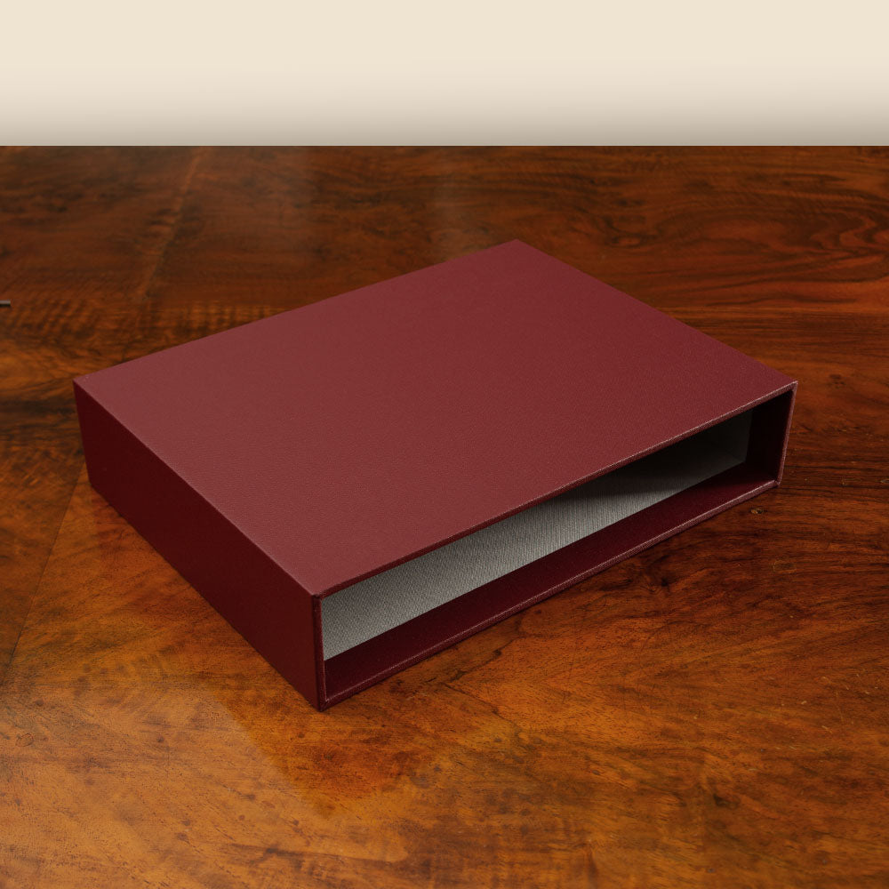 Slipcase by Hartnack and Company, bespoke luxury presentation box with fabric lining for portfolios or menu covers.