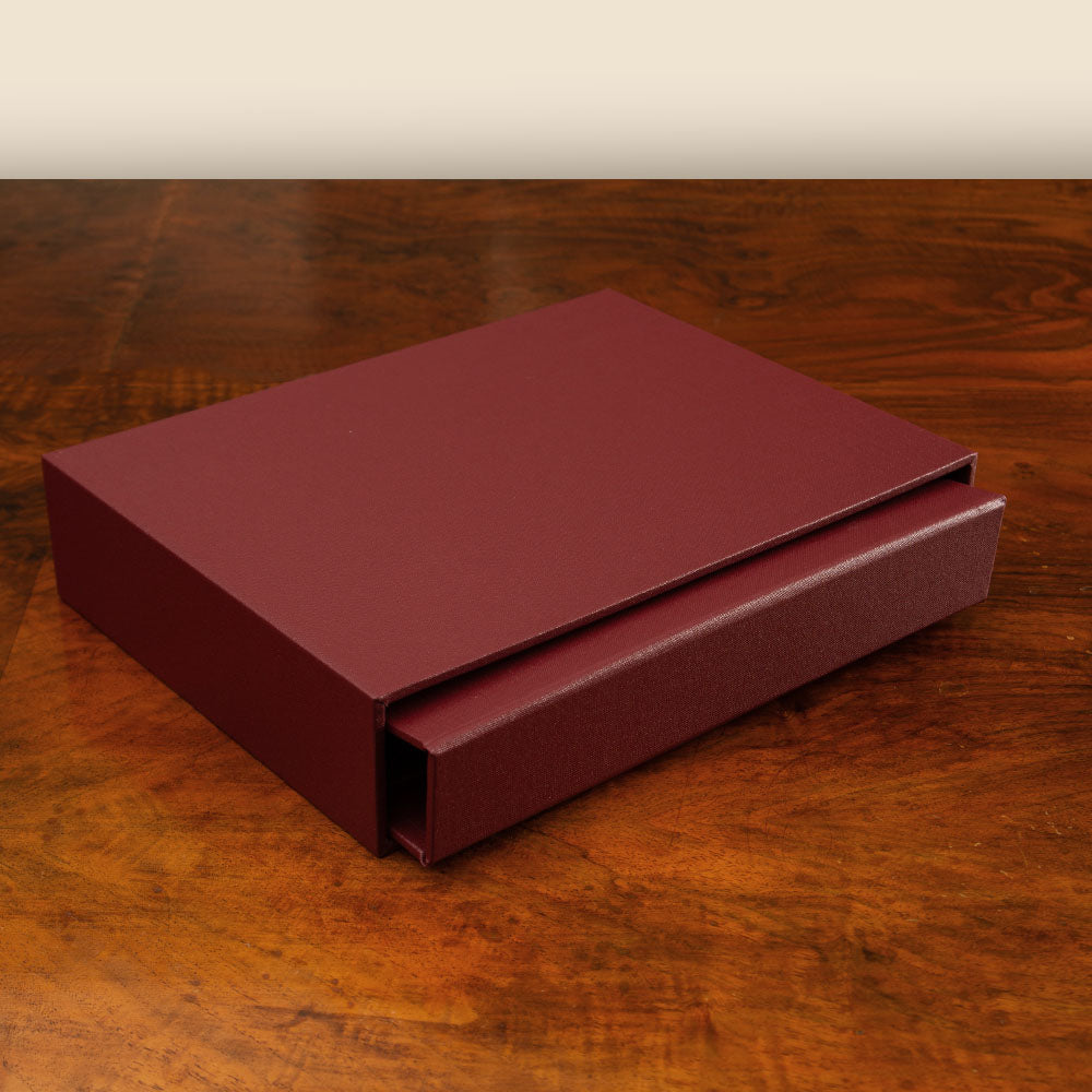 Slipcase by Hartnack and Company, bespoke luxury presentation box with traditional craftsmanship and durable fabric lining.