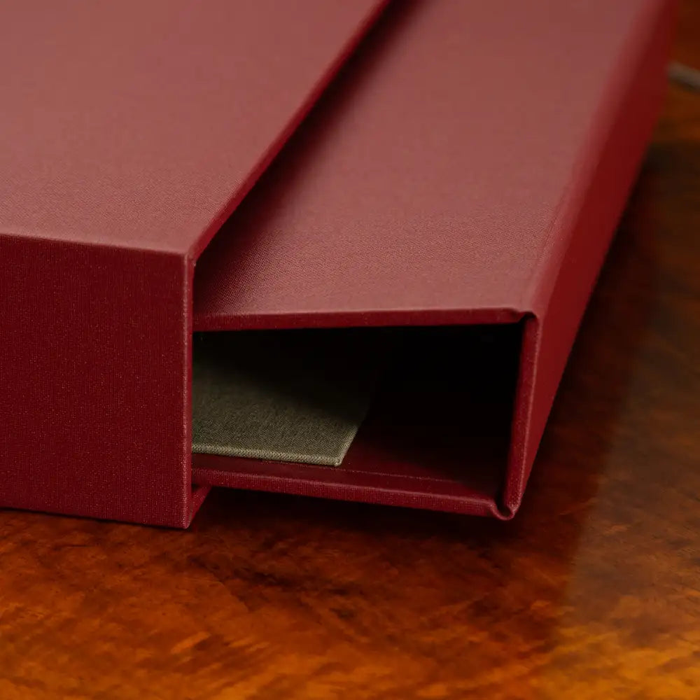 Slipcase handcrafted with luxury materials, providing a bespoke presentation box for binders and portfolio books.